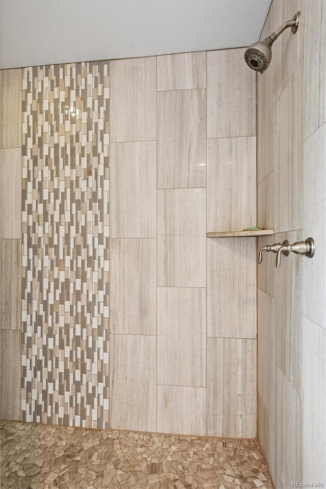 details with a tile shower