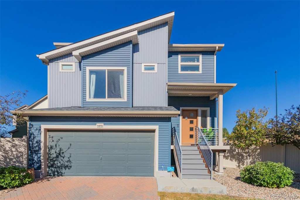 view of front of home with a garage