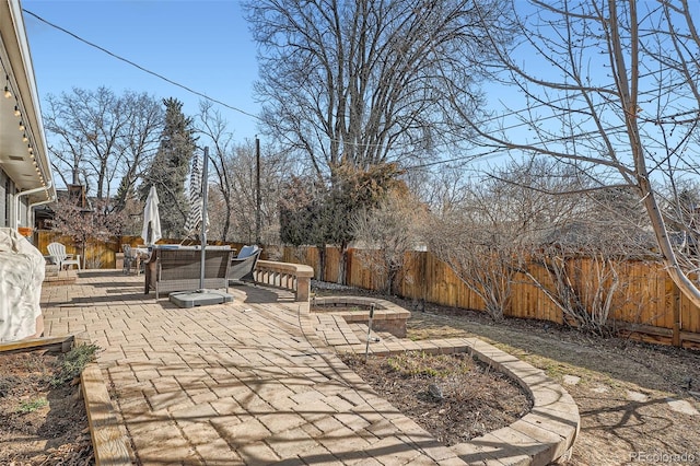 view of patio with a fenced backyard