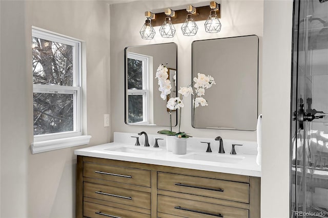 bathroom featuring plenty of natural light and vanity