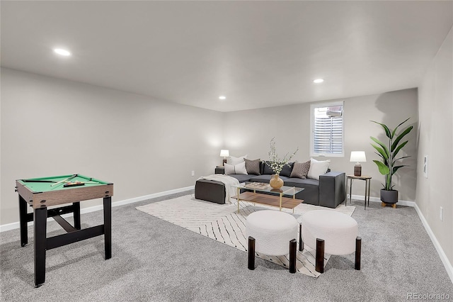 living room with light colored carpet and pool table