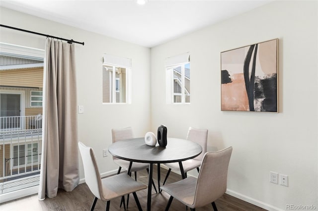 17767 E 54th Ave, Denver, CO 80249 - dining space featuring wood finished floors and baseboards