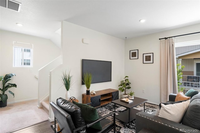 17767 E 54th Ave, Denver, CO 80249 - living room featuring stairs, wood finished floors, baseboards, and recessed lighting