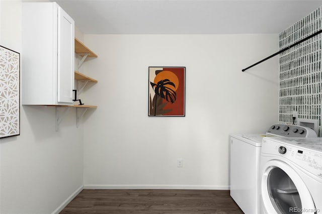 17767 E 54th Ave, Denver, CO 80249 - laundry room featuring washer and clothes dryer, dark wood-style flooring, baseboards, and cabinet space