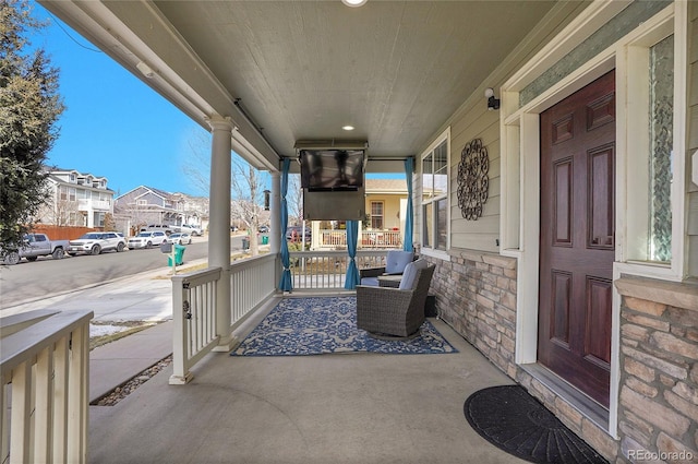 view of patio featuring a porch