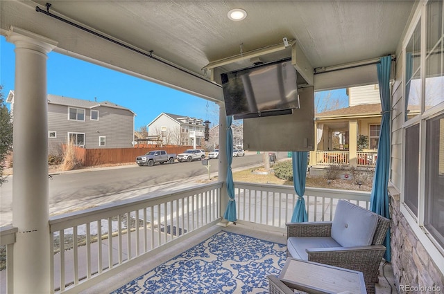 3406 Purcell St, Brighton, CO 80601 - view of patio / terrace featuring covered porch and a residential view