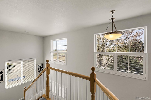 3406 Purcell St, Brighton, CO 80601 - hall with an upstairs landing and a textured ceiling