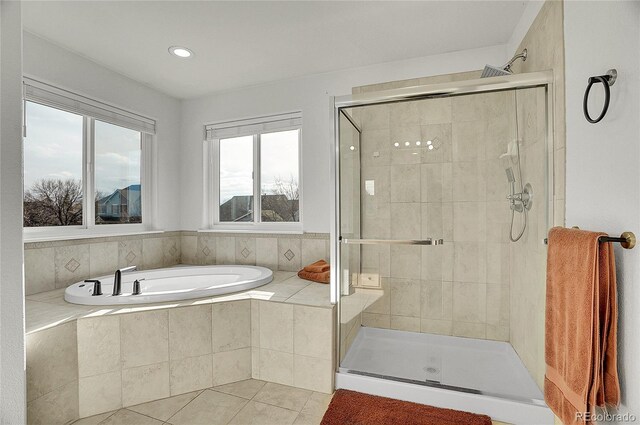 3406 Purcell St, Brighton, CO 80601 - bathroom featuring a stall shower, a garden tub, tile patterned flooring, and recessed lighting