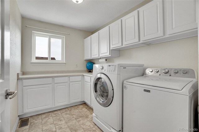 3406 Purcell St, Brighton, CO 80601 - washroom with washing machine and dryer and cabinet space
