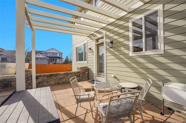 3406 Purcell St, Brighton, CO 80601 - deck featuring fence, a pergola, outdoor dining space, and a patio area