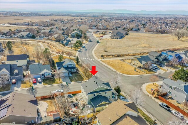3406 Purcell St, Brighton, CO 80601 - aerial view of residential area featuring a mountain backdrop