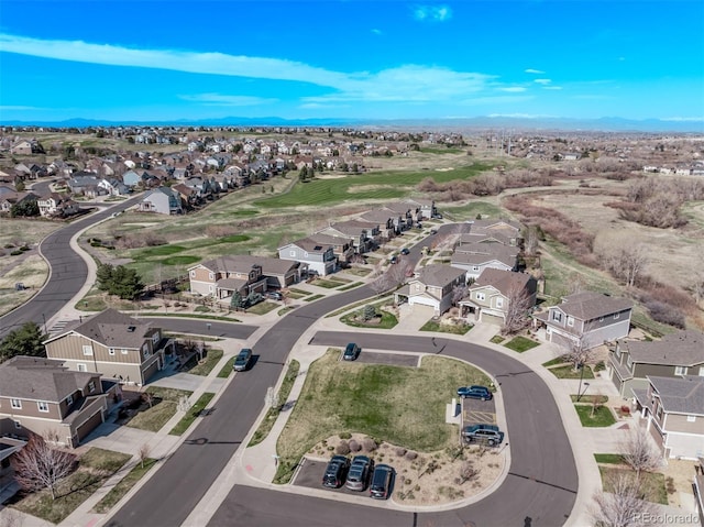 aerial perspective of suburban area with a mountain backdrop