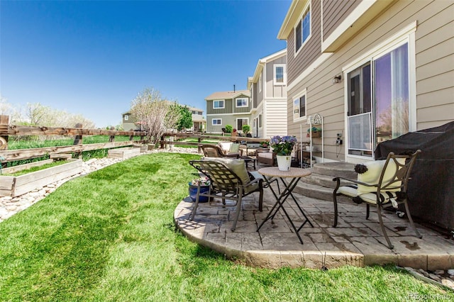 23757 Eagle Bend Ln, Parker, CO 80138 - view of grassy yard with a garden and a patio