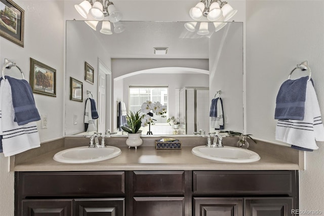 23757 Eagle Bend Ln, Parker, CO 80138 - bathroom featuring a shower stall and double vanity