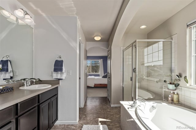 23757 Eagle Bend Ln, Parker, CO 80138 - bathroom with a shower stall, connected bathroom, a garden tub, and vanity