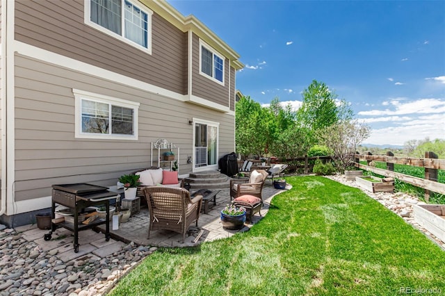 23757 Eagle Bend Ln, Parker, CO 80138 - back of house featuring a vegetable garden, a patio, and an outdoor living space