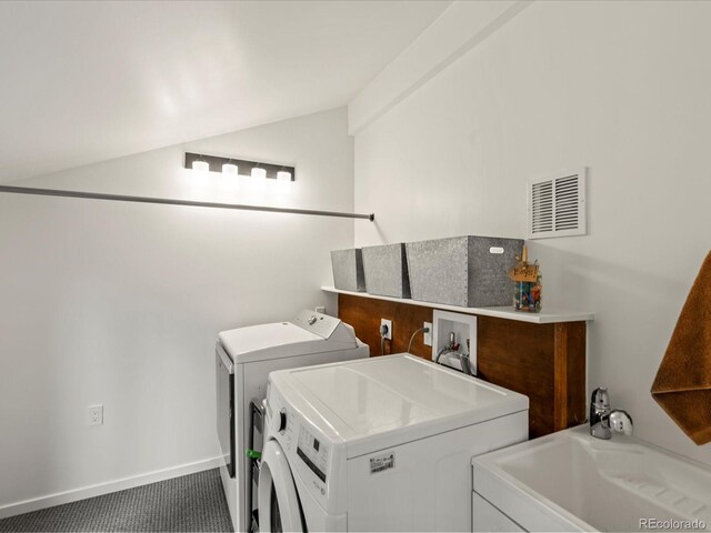 28833 Western Dr, Evergreen, CO 80439 - washroom featuring independent washer and dryer and carpet floors