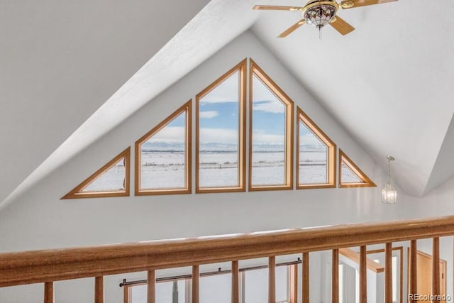 bonus room with vaulted ceiling and ceiling fan