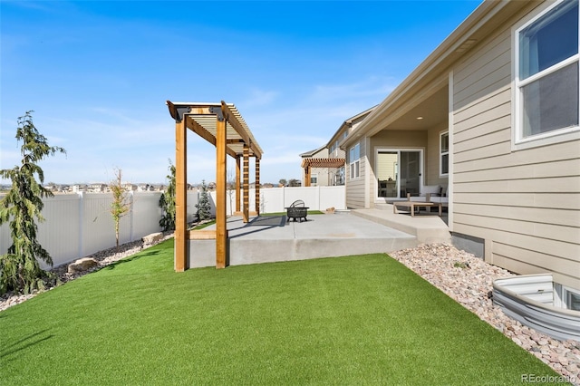 view of yard featuring a patio, a pergola, and a fenced backyard