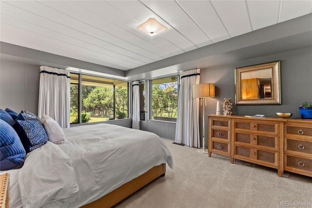 bedroom with light colored carpet