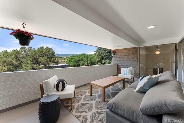 balcony with an outdoor hangout area