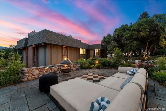 patio terrace at dusk with an outdoor hangout area