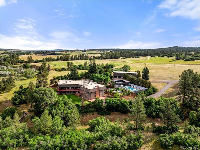 birds eye view of property featuring a rural view