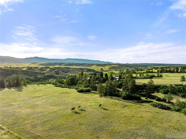 property view of mountains featuring a rural view