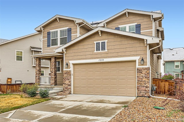 17859 E 108th Pl, Commerce City, CO 80022 - craftsman inspired home featuring stone siding, an attached garage, fence, and concrete driveway