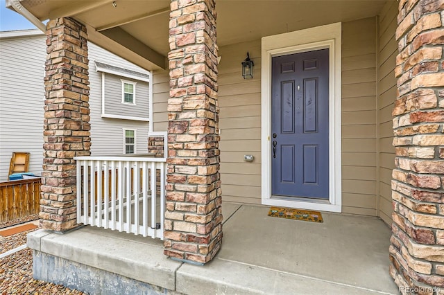 17859 E 108th Pl, Commerce City, CO 80022 - doorway to property featuring a porch