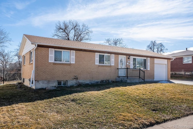 ranch-style home with brick siding, fence, a garage, driveway, and a front lawn