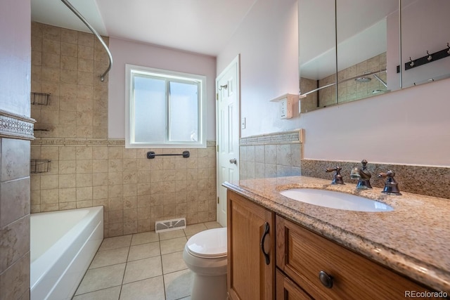 bathroom with toilet, visible vents, tile walls, tile patterned floors, and walk in shower