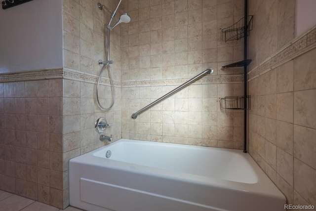 full bathroom featuring shower / bathtub combination and tile walls