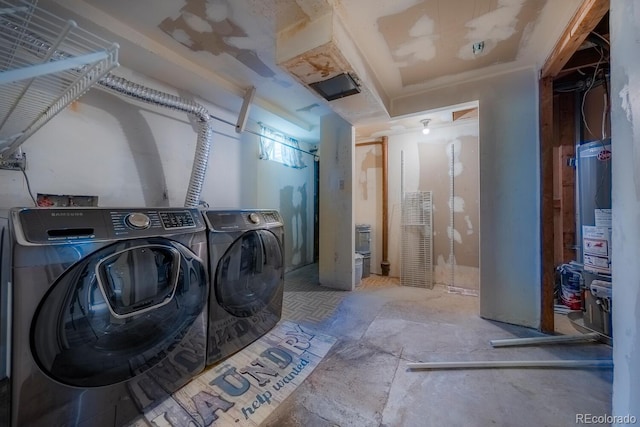 washroom with laundry area and washer and clothes dryer