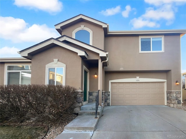 view of front of property featuring a garage