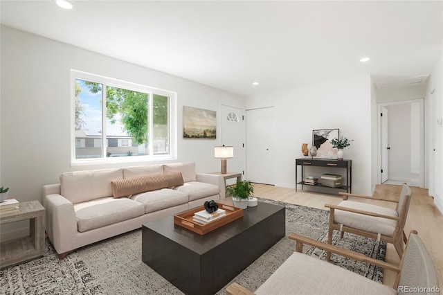 5554 Crystal Way, Denver, CO 80239 - living area featuring recessed lighting and light wood-style flooring