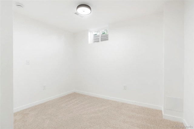 5554 Crystal Way, Denver, CO 80239 - spare room with light carpet and a smoke detector