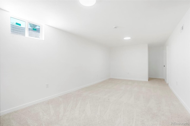 5554 Crystal Way, Denver, CO 80239 - below grade area with light carpet and recessed lighting