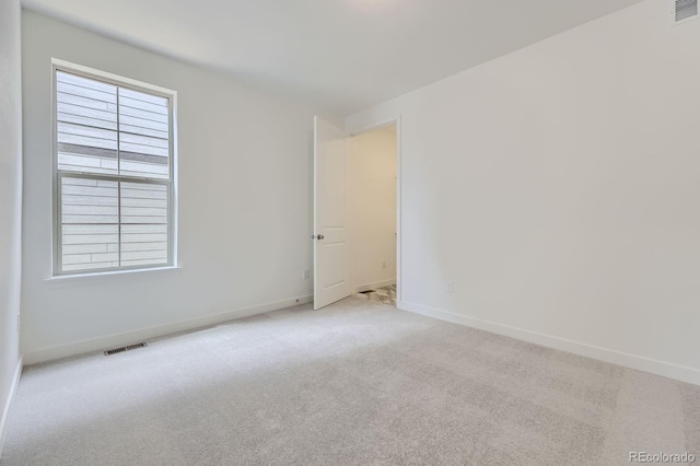 15153 W Dequesne Ave, Morrison, CO 80465 - spare room with light carpet and baseboards