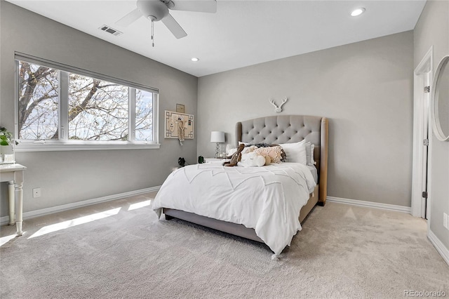 bedroom featuring light carpet, baseboards, recessed lighting, and a ceiling fan