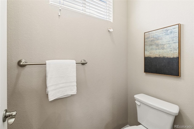 bathroom featuring toilet
