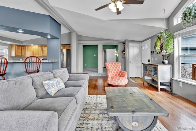 248 Copperdale Ln, Golden, CO 80403 - living area featuring visible vents, ceiling fan, lofted ceiling, and hardwood / wood-style floors