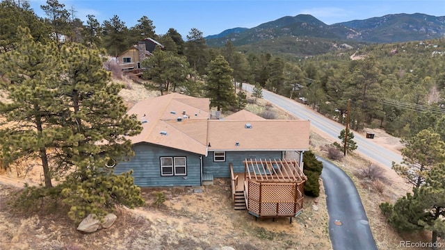 248 Copperdale Ln, Golden, CO 80403 - view from above of property featuring a mountainous background and a heavily wooded area