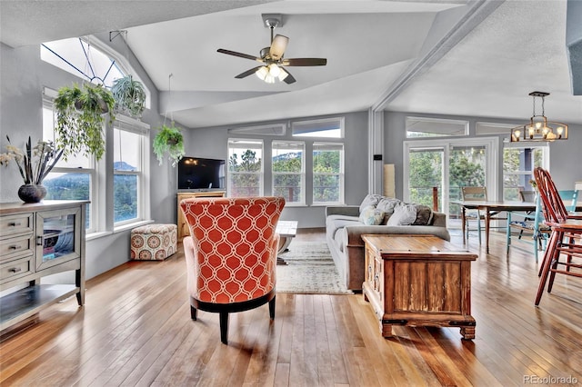 248 Copperdale Ln, Golden, CO 80403 - living room with vaulted ceiling, light wood-type flooring, plenty of natural light, and a ceiling fan