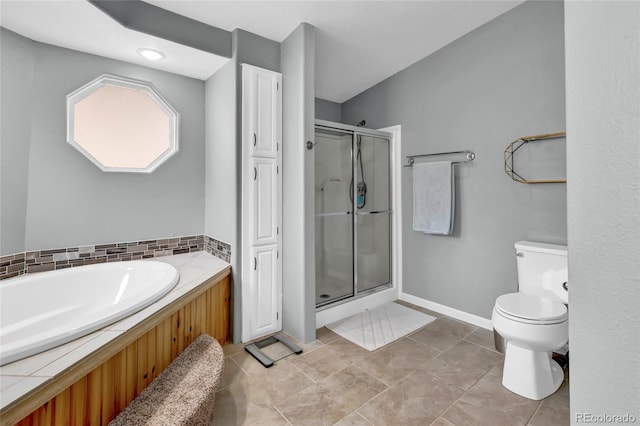 248 Copperdale Ln, Golden, CO 80403 - bathroom featuring a stall shower, a bath, and tile patterned floors