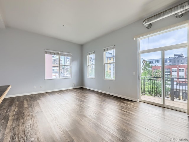 2501 15th St Unit 3D, Denver, CO 80211 - unfurnished room with wood finished floors and baseboards