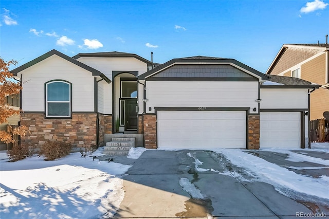 view of front of property with a garage