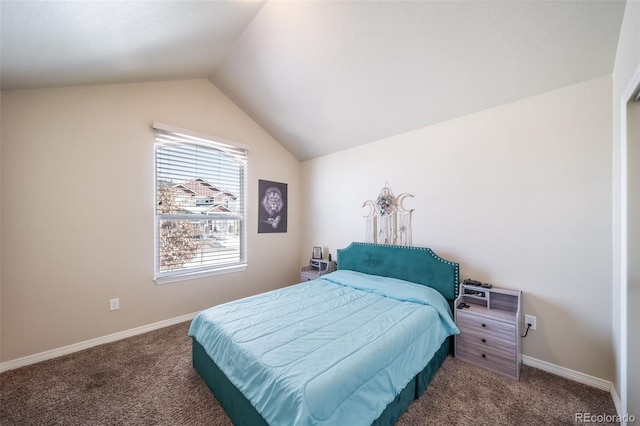 carpeted bedroom featuring lofted ceiling