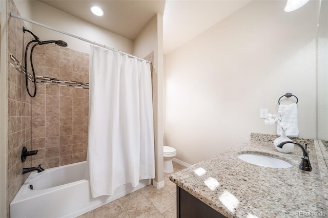 full bathroom with vanity, shower / bath combination with curtain, tile patterned floors, and toilet