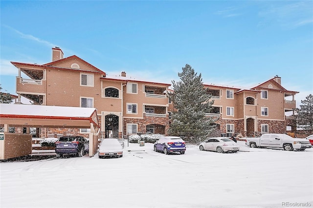 view of snow covered building